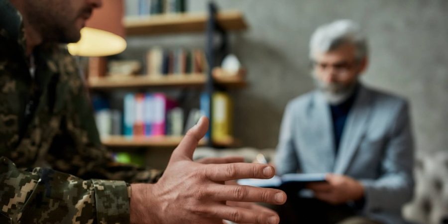 Man and psychologist in Residential Rehab Treatment