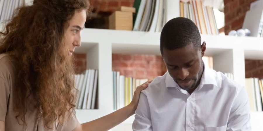 A man being treated by a woman at a dual diagnosis treatment center