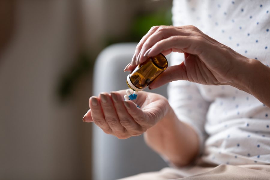 Woman taking medication for addiction treatment